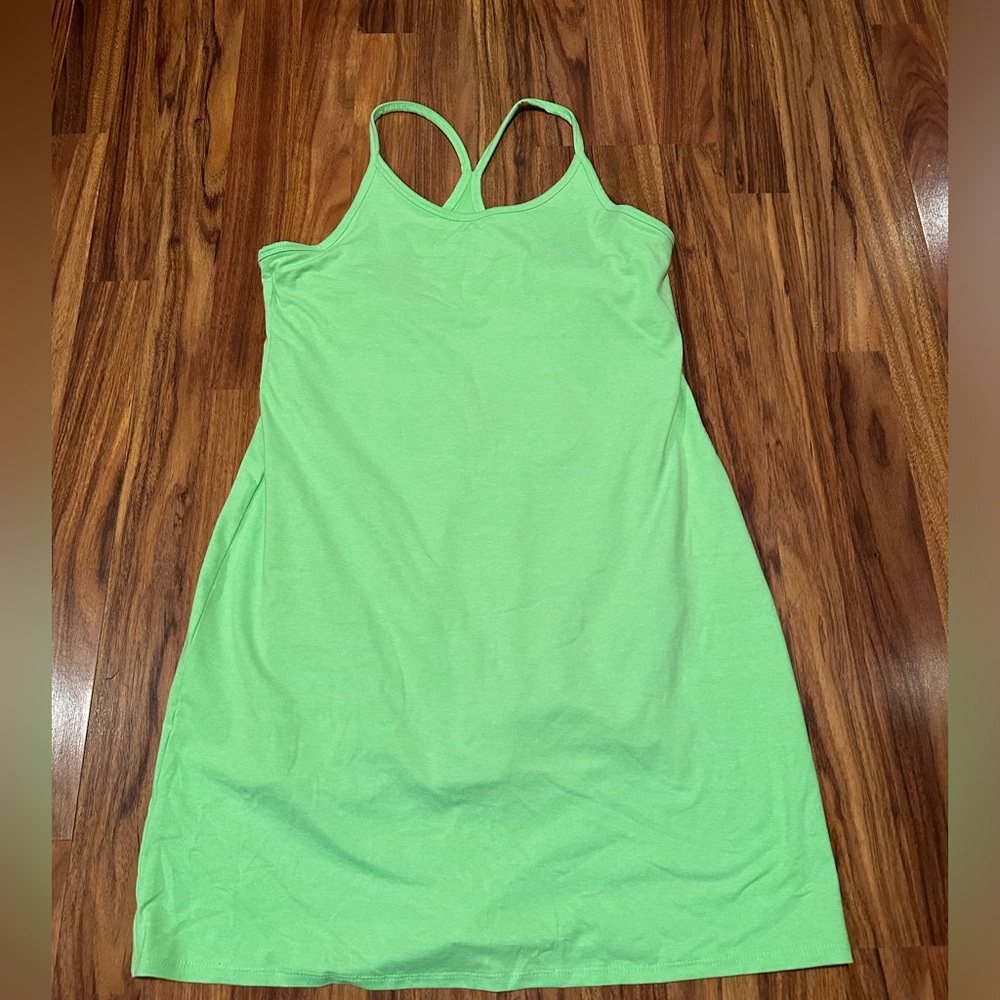 Neon green tennis dress by Kyodan